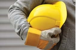 worker holding hardhat