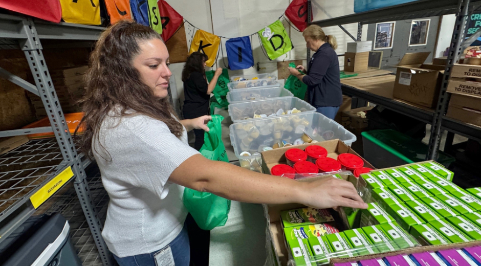 Employees helping at the food bank