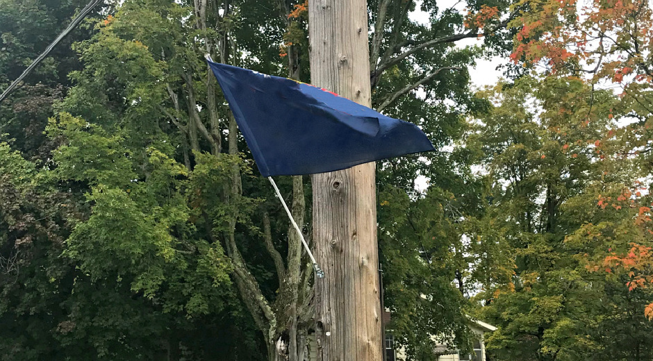 flag on utility pole