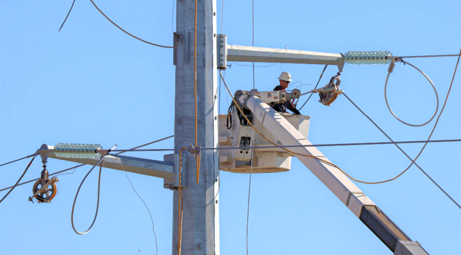 Line worker in bucket truck