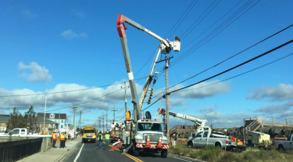 Utility crews working on power lines