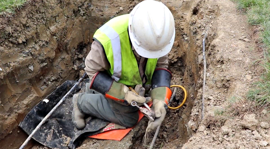 lineman working on underground lines