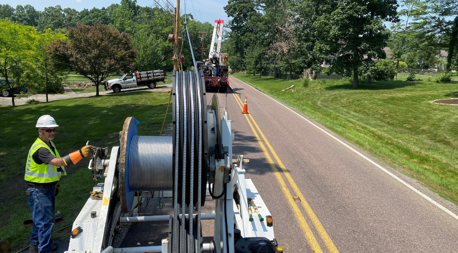 Line worker around a bucket truck